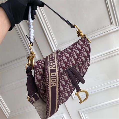 fake dior saddle pouch|knockoff dior buckle bag.